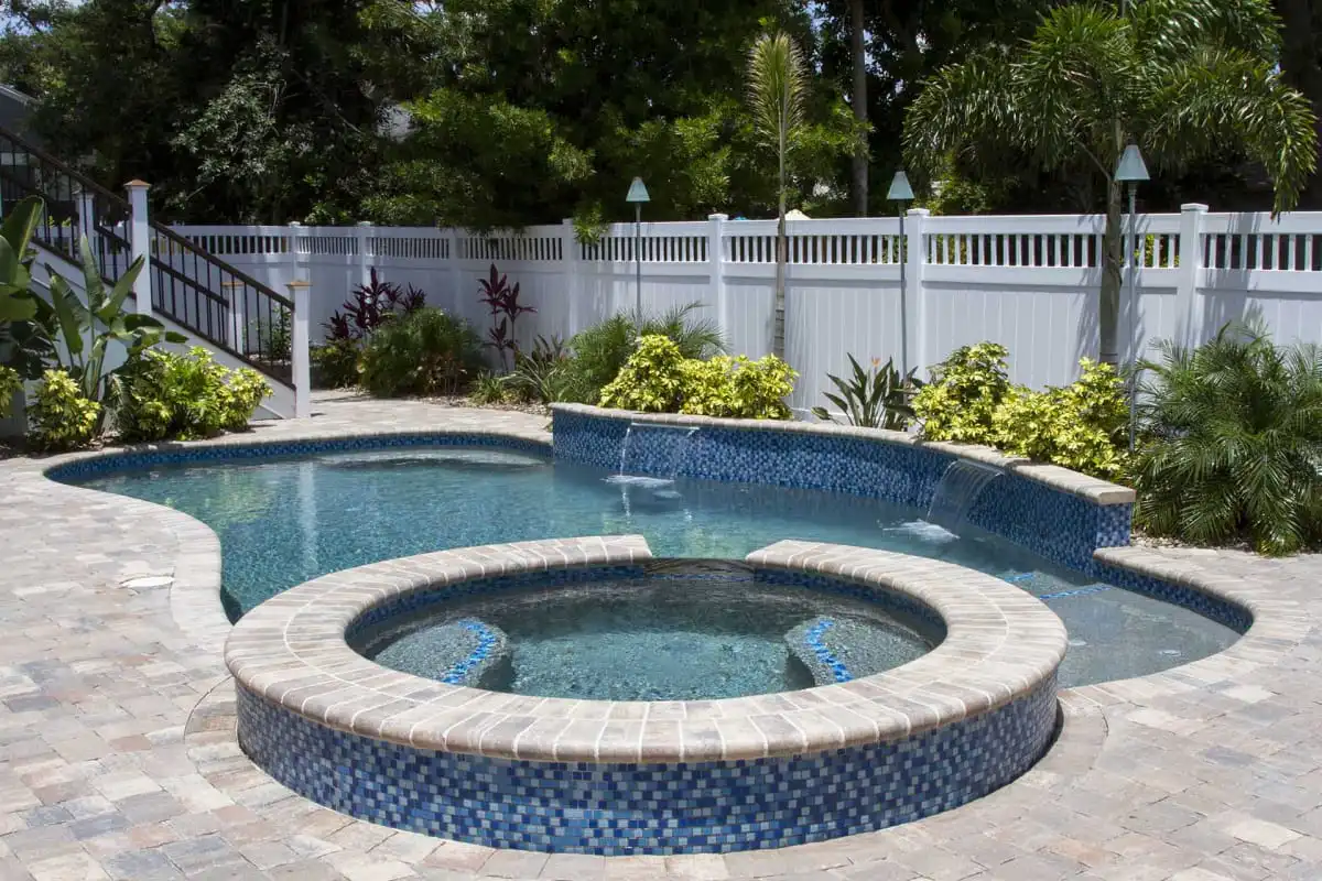 04-Lovely-pool-with-spa-planter-wall-and-waterfalls.jpg