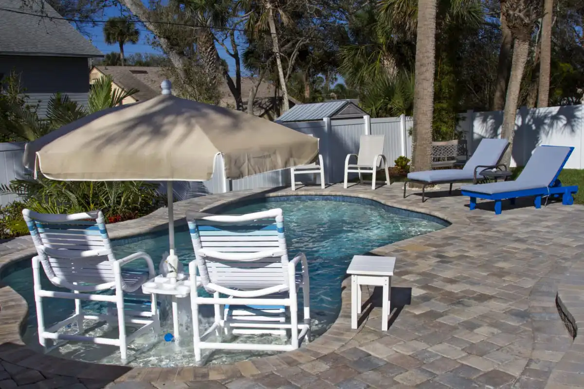 09-Plenty-of-room-to-relax-poolside-around-this-custom-pool-by-All-Aqua-Pools.jpg