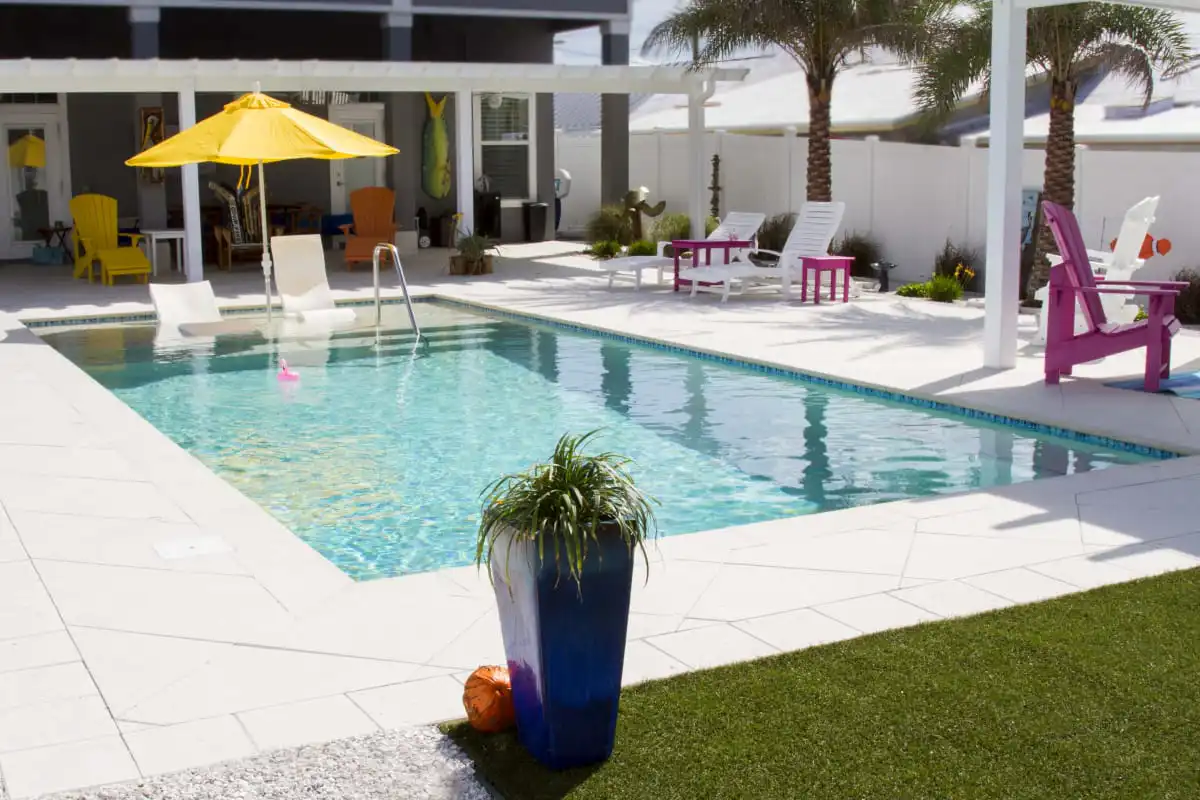 12-the-large-sun-shelf-at-one-end-of-the-pool-has-room-for-an-umbrella-and-two-lounge-chairs.jpg