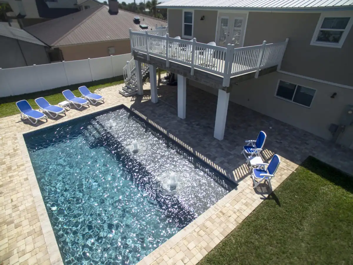 14-modern-pool-with-paver-deck.jpg