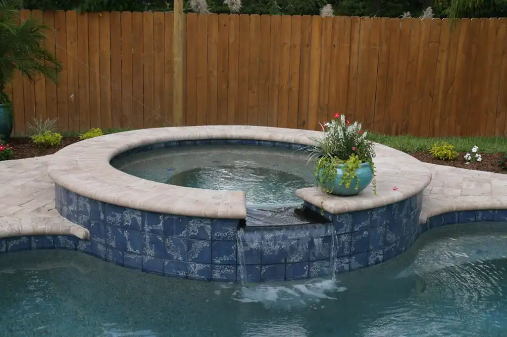 15-Attached-spa-with-polished-black-granite-waterfall.jpg