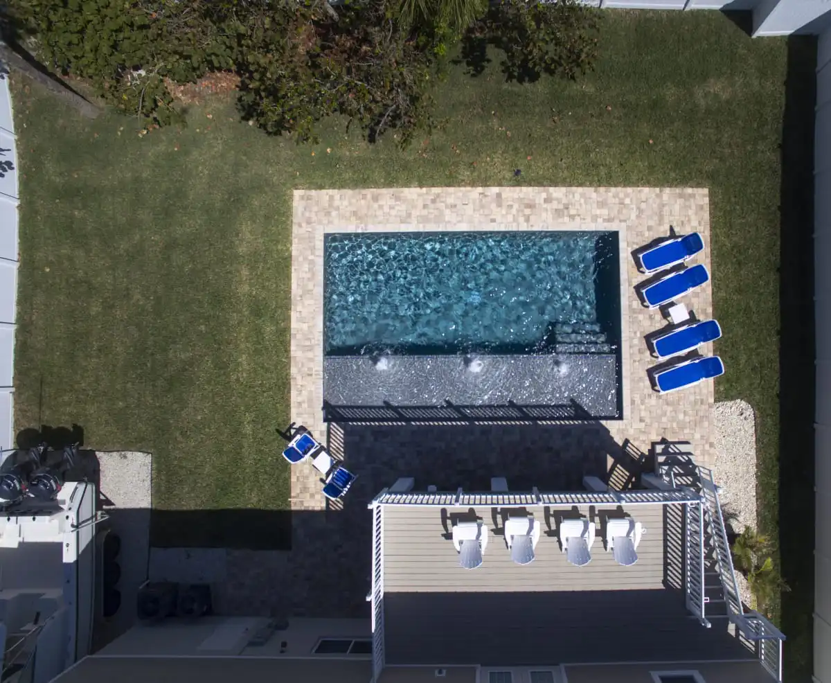 15-drone-shot-of-modern-pool-wiht-huge-sunshelf.jpg