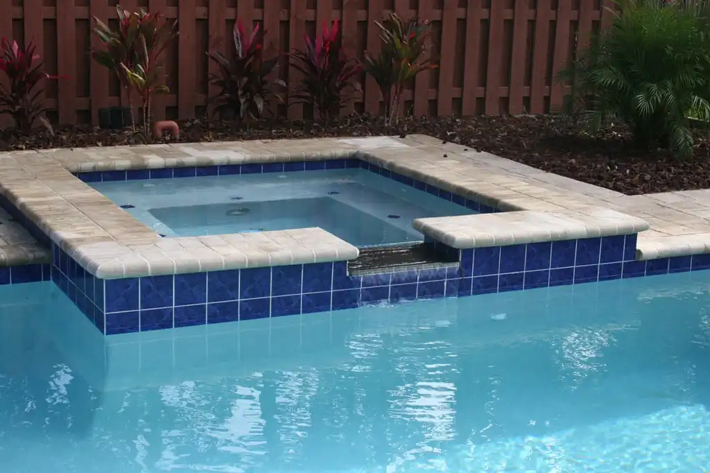 28-spa_with_black_granite_spillover__port_orange_florida_pool.jpg