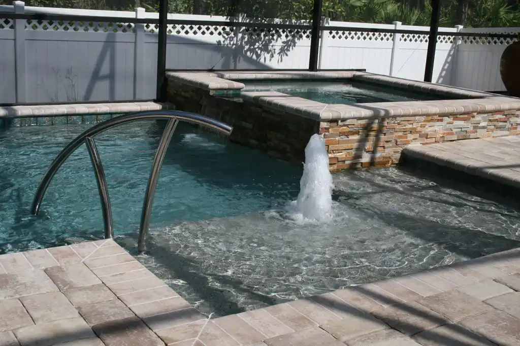 33-custom-pool-with-sunshelf-and-spa.jpg