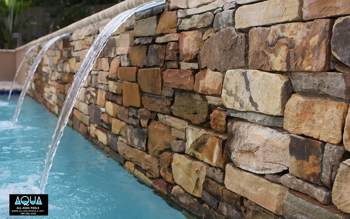 39-rock-wall-in-modern-pool.jpg