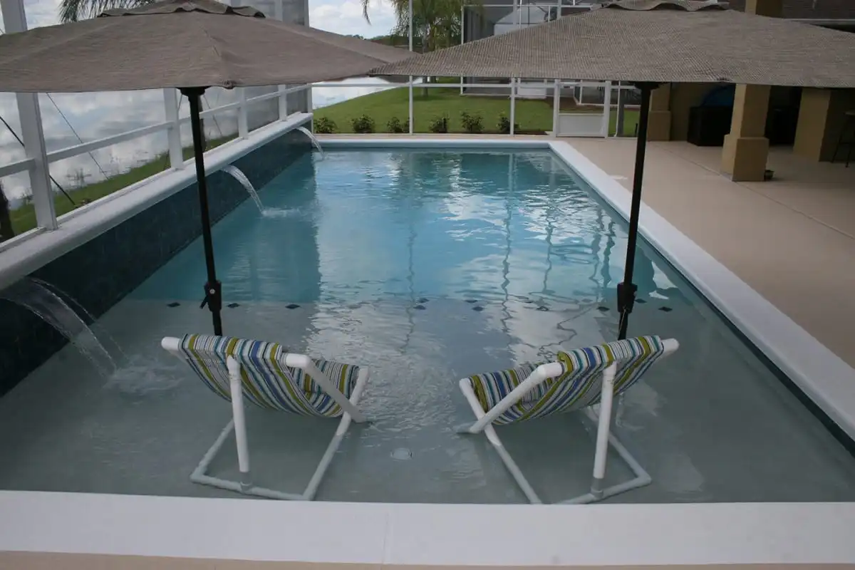 44-custom-pool-with-sunshelf.jpg