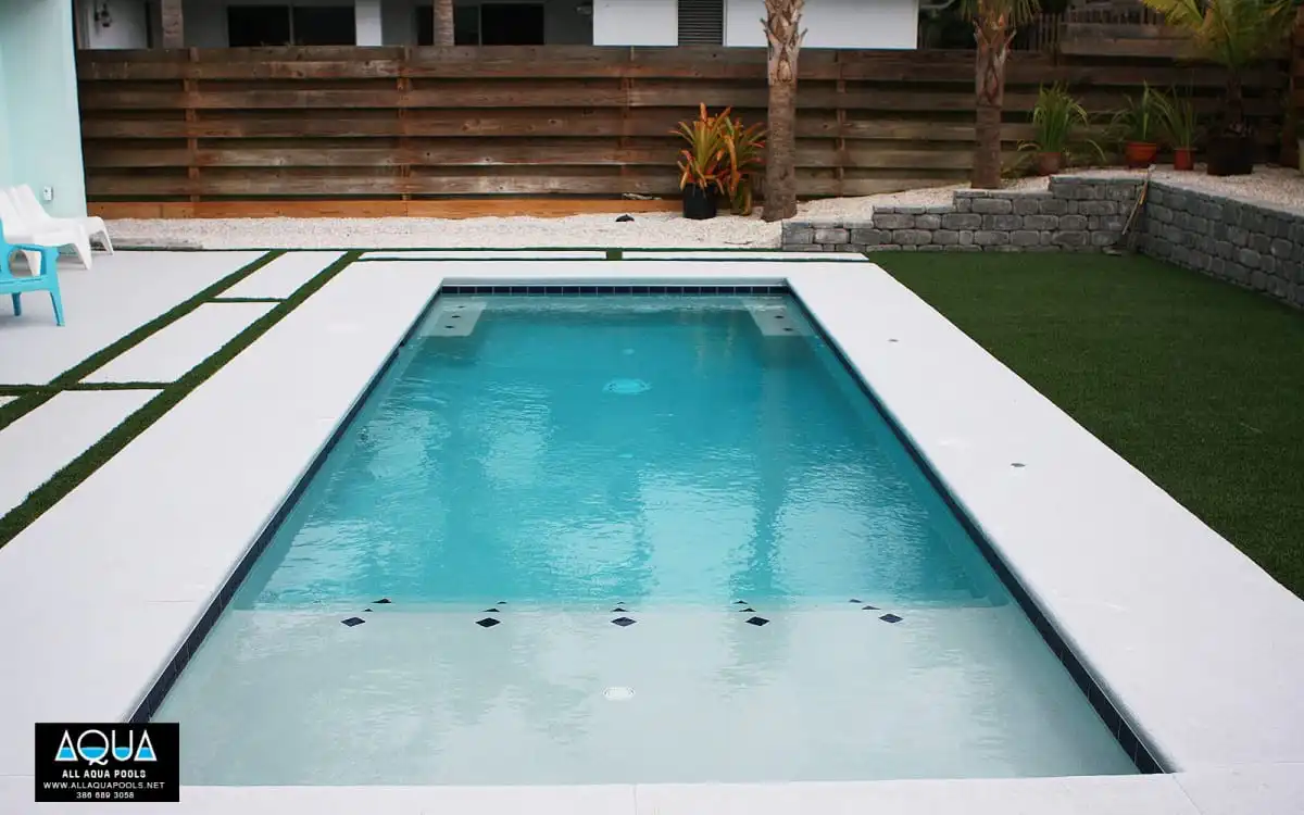 51-modern-pool-with-bench-and-sun-shelf.jpg