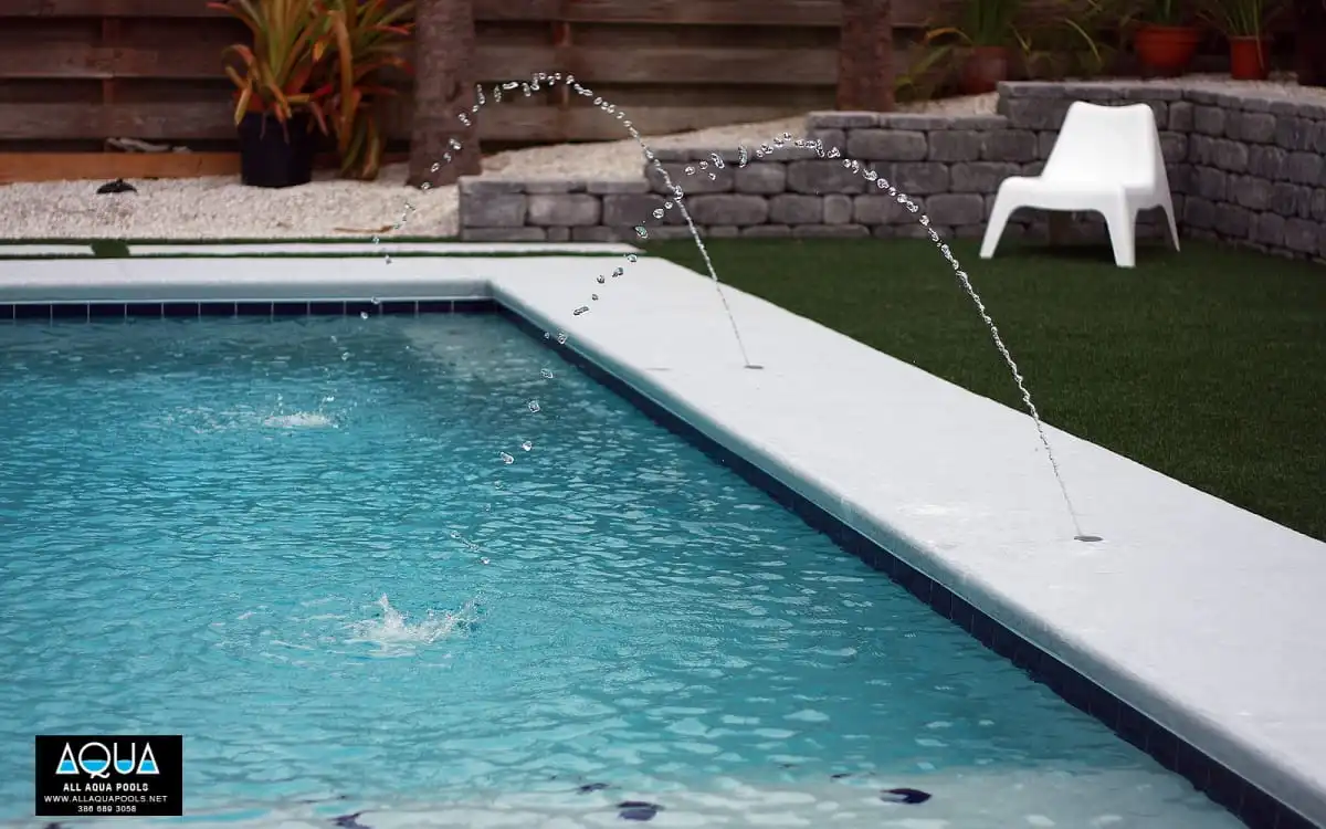 53-deck-jets-in-modern-pool.jpg