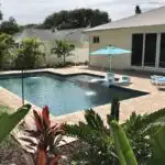 Modern-pool-with-paver-deck-and-sun-shelf.jpg