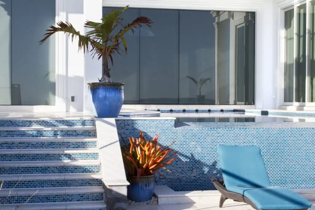 Tile-infinity-edge-wall-and-matching-stairs.jpg