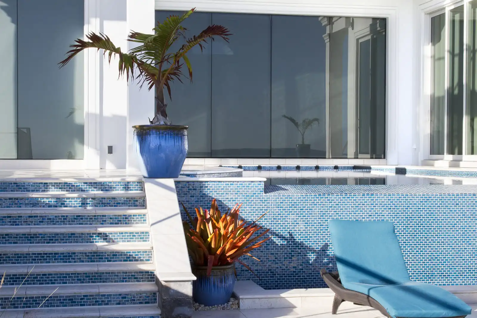 Tile-infinity-edge-wall-and-matching-stairs.jpg
